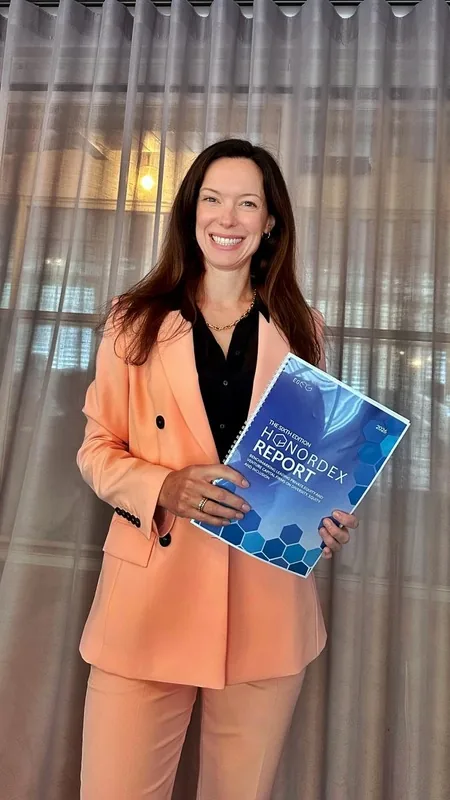 Client holding a printed report